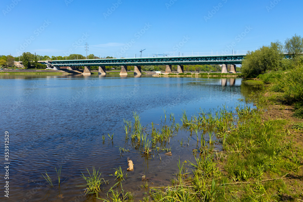 Panoramic view of Gdansk Bridge - Most Gdanski - two-deck steel truss construction over Vistula river in northern part of Warsaw, Poland Panoramic view of Gdansk Bridge - Most Gdanski - two-deck steel truss construction over Vistula river in northern part of Warsaw, Poland