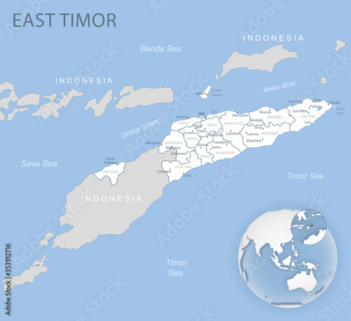 Blue-gray detailed map of East Timor administrative divisions and location on the globe.