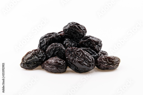 Dried prunes isolated on white background
