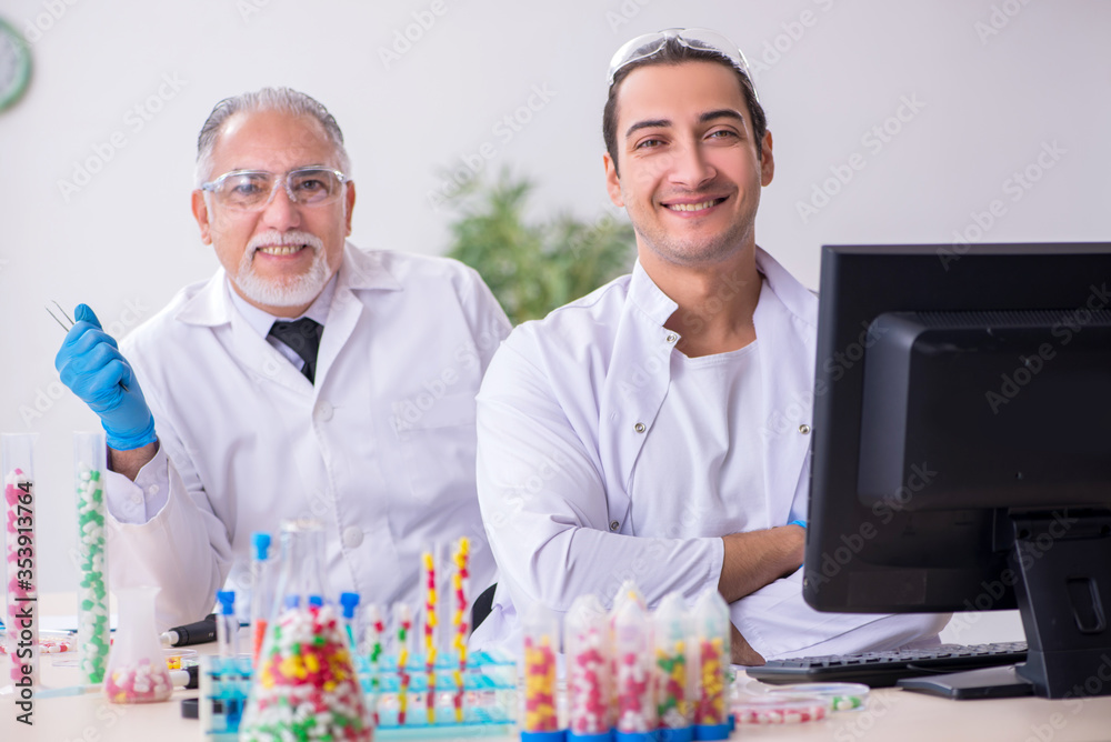 Two chemists working in the lab Two chemists working in the lab