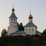Russia, Moscow region, St. Nicholas Church on the hill in Tishkovo near Vyaz river on a summer evening