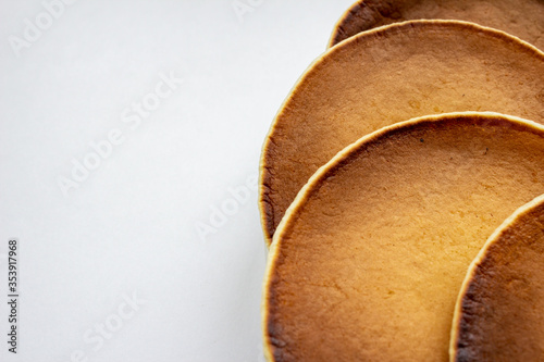 Pancakes close-up on a white background. Macro photo