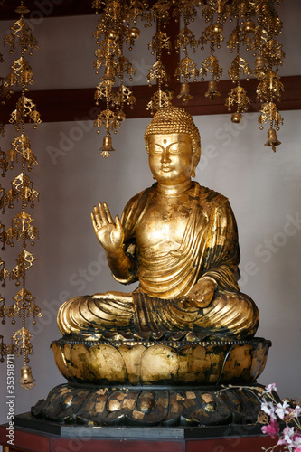 Gold Buddha meditation shrine Kyoto Japan