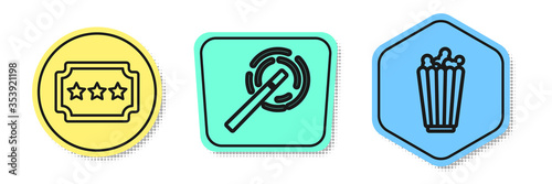 Set line Ticket, Magic wand and Popcorn in box. Colored shapes. Vector.