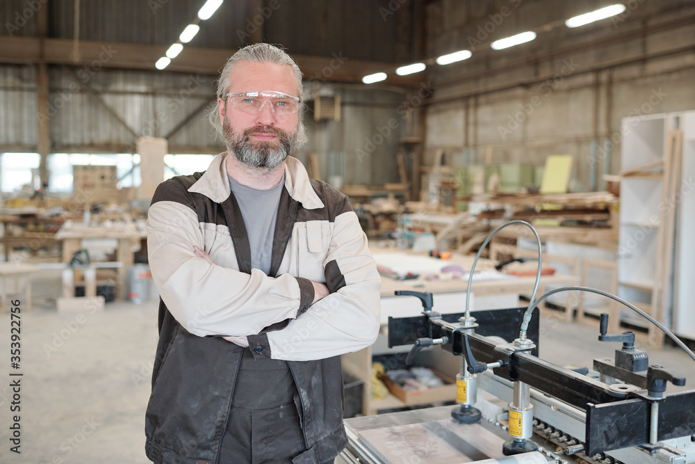 Successful senior master of contemporary furniture producing factory