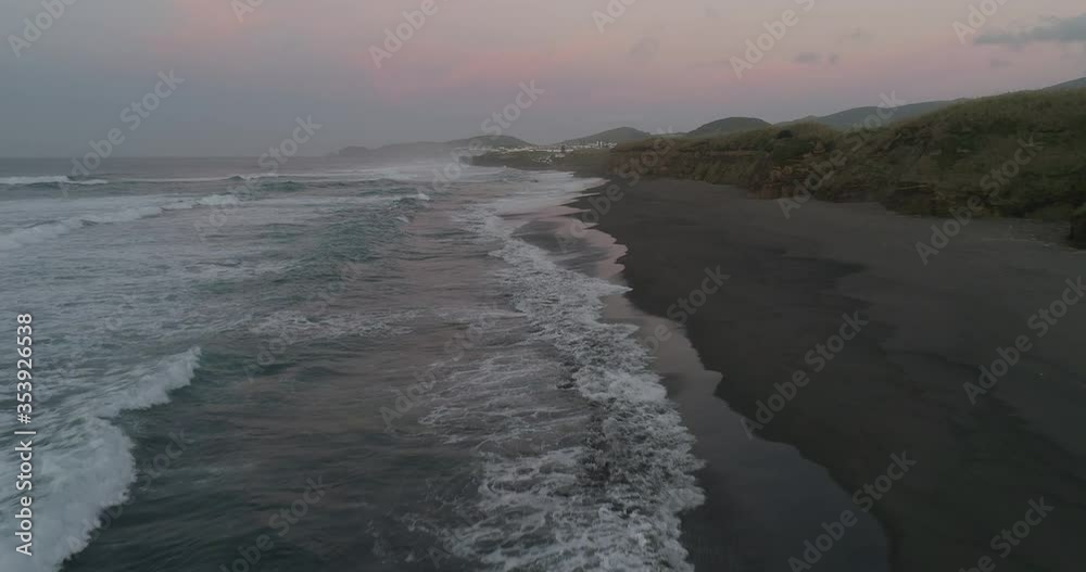Waves moving in a volcanic beach Waves moving in a volcanic beach