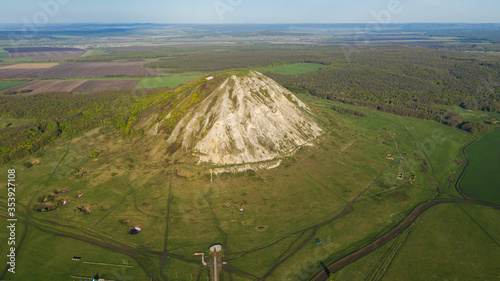 The remain of the reef of the ancient sea - solitary mountain Toratau. photo