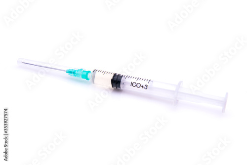 Syringe with vaccine for covid-19 on white background