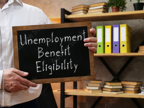 Unemployment Benefit Eligibility is shown on the conceptual business photo
