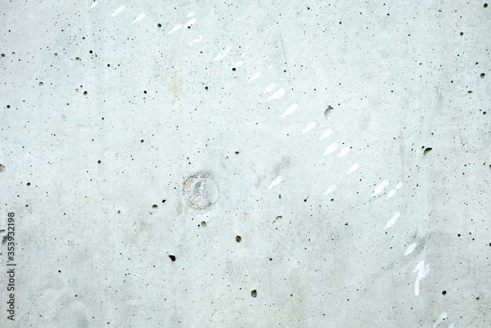 White Stain Paint on Gray Raw Concrete Wall Texture Background. White Stain Paint on Gray Raw Concrete Wall Texture Background.