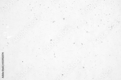 White Raw Concrete Wall Texture Background Suitable for Presentation, Mockup, Backdrop and Web Templates with Space for Text.