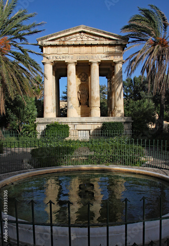 LOWER BARRAKKA GARDENS, VALLETTA, MALTA - NOVEMBER 16TH 2019: The neoclassical style monument dedicated to Sir Alexander Ball a former rear admiral and civil commissioner of Malta until 1809