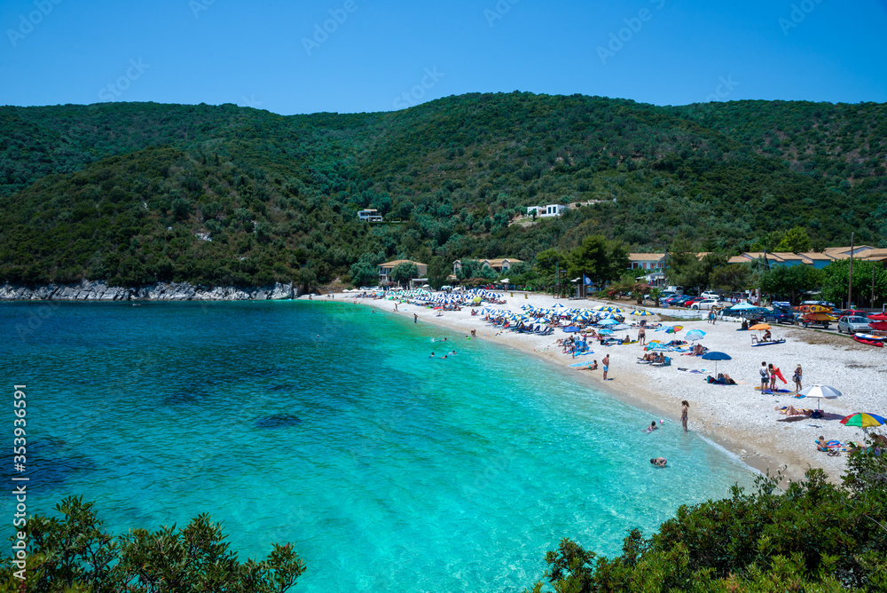 Panoramic view of Micros Poros beach and turquoise water in summer holiday in Greece