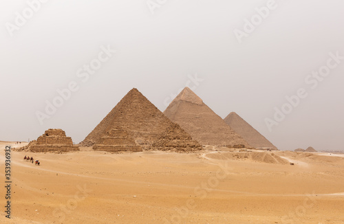 The pyramids of Giza  Menkaure  Khafre  and Khufu  Cairo