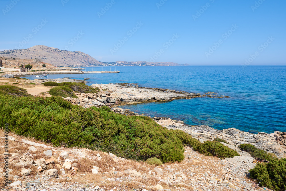 Rocky coast with transparent water near Glistra and Ladros beach on the island of Rhodes