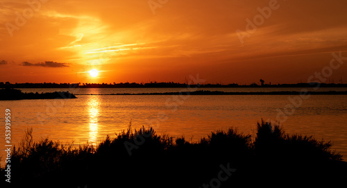 Beautiful sunset on a lake. Golden our.