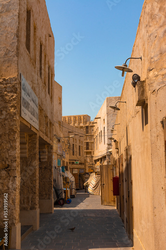 Doha, Qatar, Year 2019: Hallways with shops in the Souq Waqif tourist market. Traditional construction.