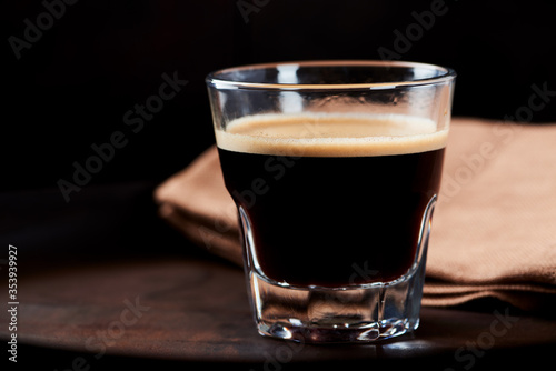 Cup of espresso on dark background. Close up.