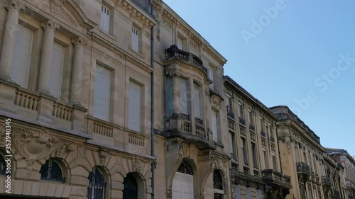 Beautiful facades of typical ancient houses in a residential area in center of city south of France