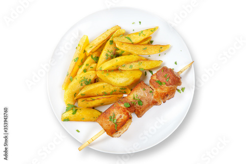 pork skewer with grilled potatoes isolated on a white background