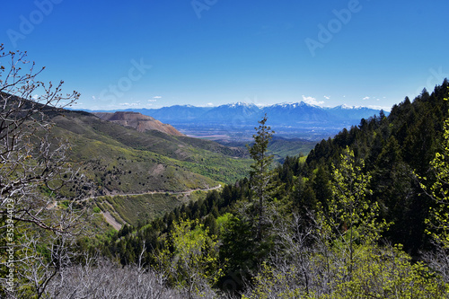 Rocky Mountain Wasatch Front peaks, panorama landscape view from Butterfield Canyon Oquirrh range by Rio Tinto Bingham Copper Mine, Great Salt Lake Valley in fall. Utah, United States.