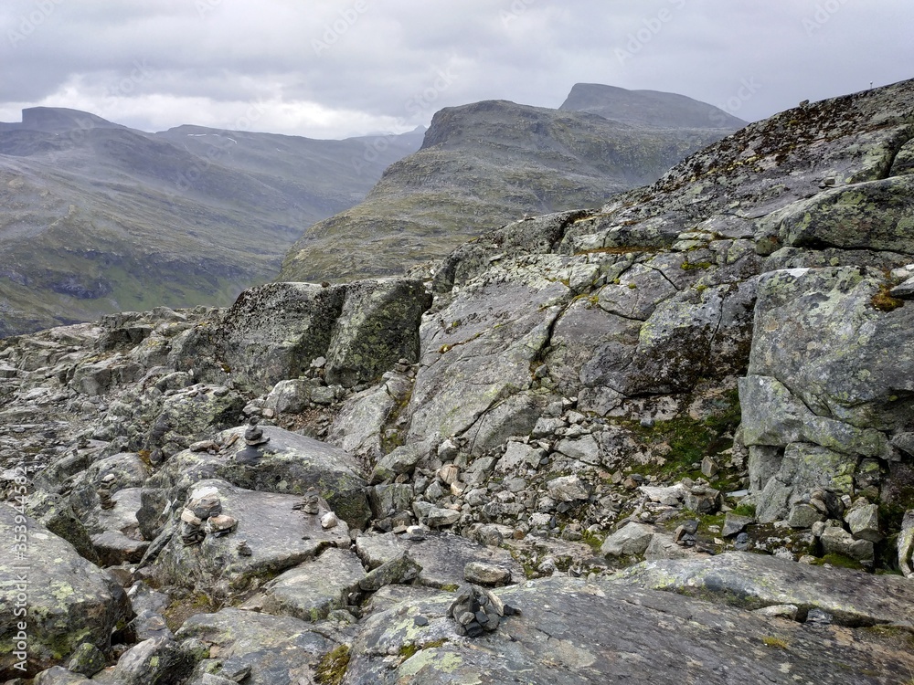 Fototapeta premium View on Geiranger fjord, rocks and the valley at cloudy weather.