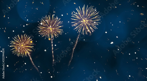 Photography Beautiful Holiday blue background with yellow fireworks