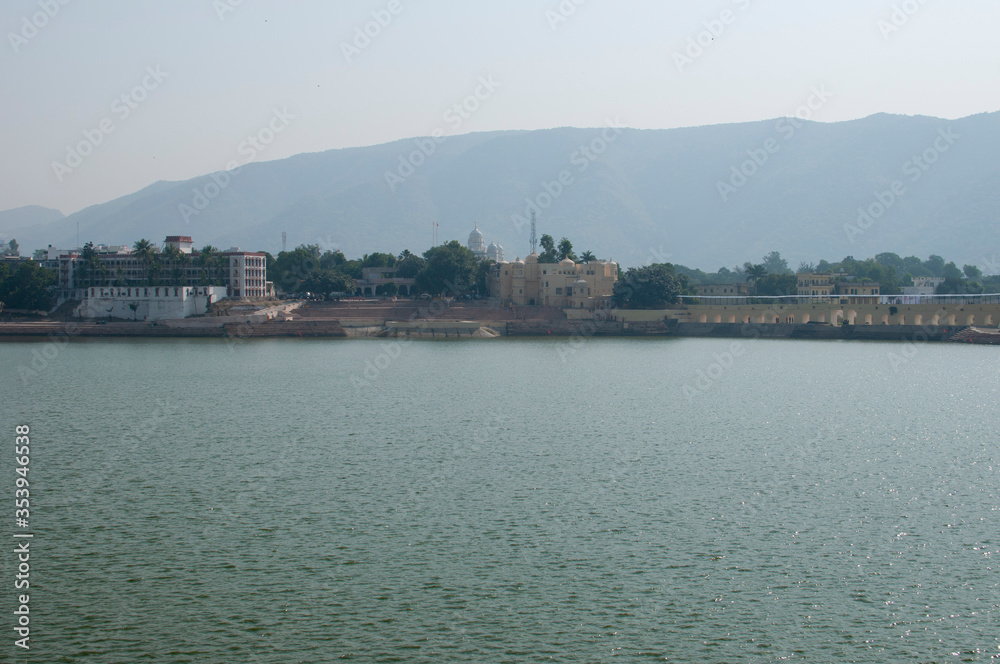Pushkar Lake or Pushkar Sarovar is a sacred lake of the Hindus is located in the town of Pushkar in Ajmer district of the Rajasthan state of western India Pushkar Lake or Pushkar Sarovar is a sacred lake of the Hindus is located in the town of Pushkar in Ajmer district of the Rajasthan state of western India