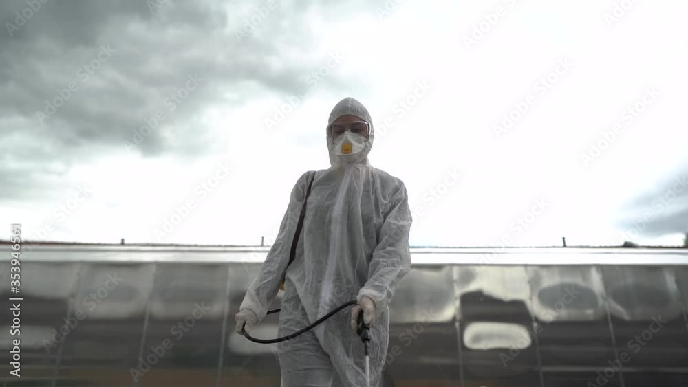 Professional disinfector in hazmat protection suit and N95 mask with chemical decontamination sprayer tank.Disinfecting streets and public areas to stop COVID-19 .Coronavirus disinfection concept
Professional disinfector in hazmat protection suit and N95 mask with chemical decontamination sprayer tank.Disinfecting streets and public areas to stop COVID-19 .Coronavirus disinfection concept