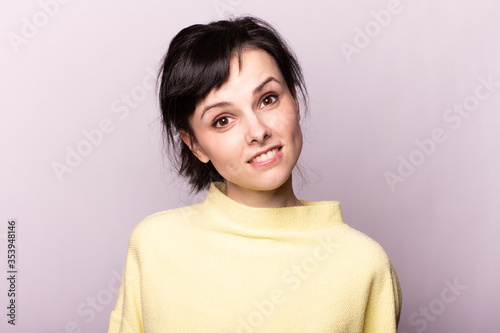 beautiful girl in a yellow sweater 