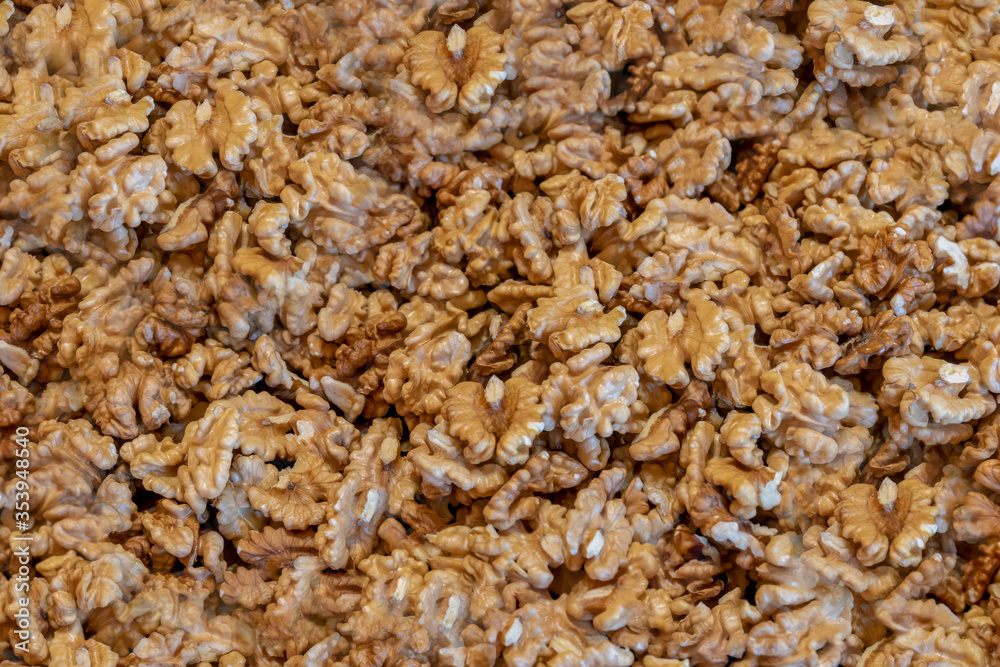 Peeled walnuts. Background. Texture. Peeled walnuts. Background. Texture.