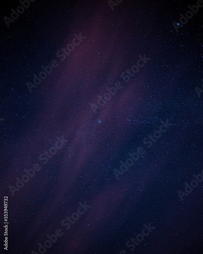 Fototapeta Naklejka Na Ścianę i Meble -  Night sky stars detail background with cloud, and blue, pink and purple colours