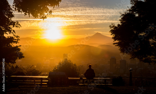 The Sun Rising Over Mount Hood and the city of Downtown Portland, Oregon © Jacob