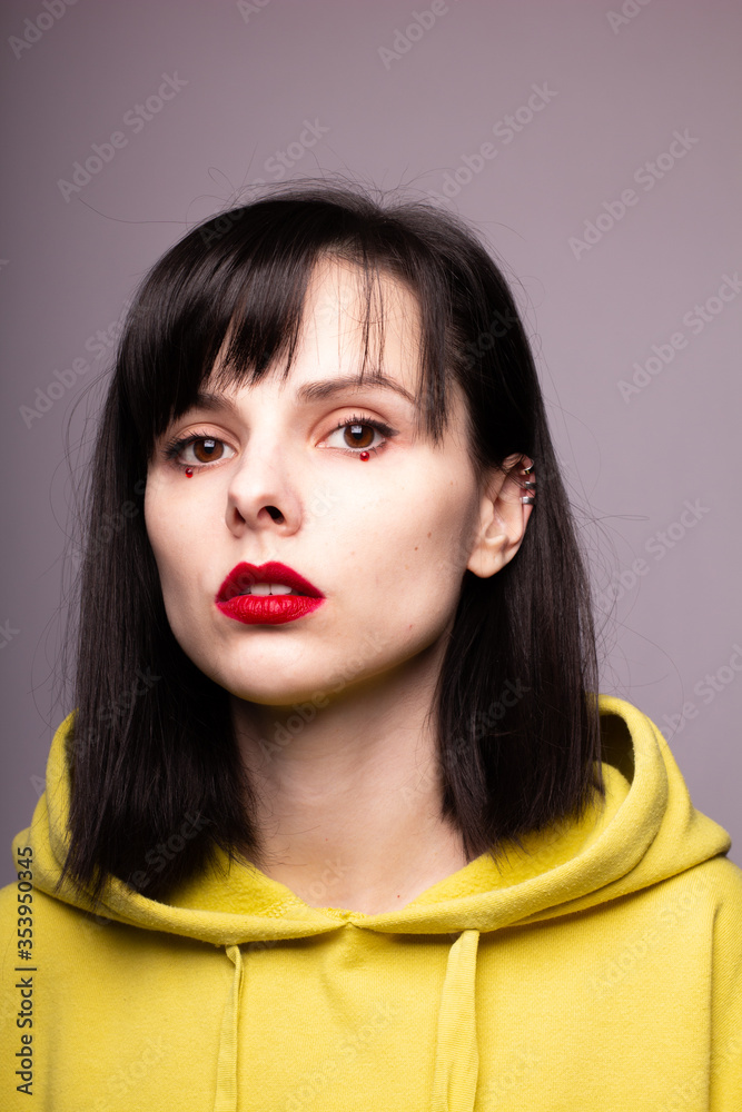 beautiful young girl with red lipstick on lips beautiful young girl with red lipstick on lips