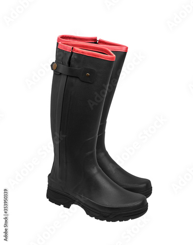 Rubber boots isolate on a white back. Shoes for bad weather or gardening. Shoes of a farmer, hunter or gardener.