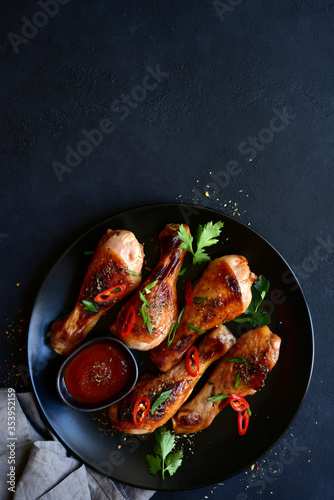 Grilled chicken legs. Top view with copy space.