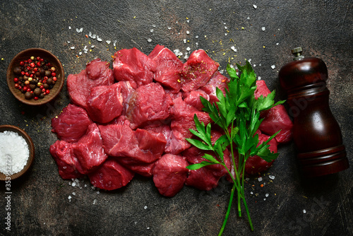 Fotografia, Obraz Raw organic meat ( beef or lamb ) . Top view with copy space.