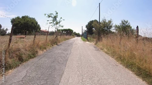 secondary paved road leaving Formello, Metropolitan City of Rome, Lazio, Italy