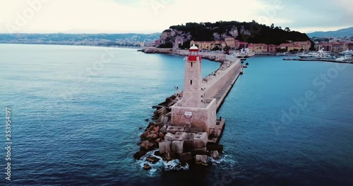 Nice, France, Aerial footage of lighthouse. Beautiful sunrise above the Mediterranean Sea. Cote D Azur