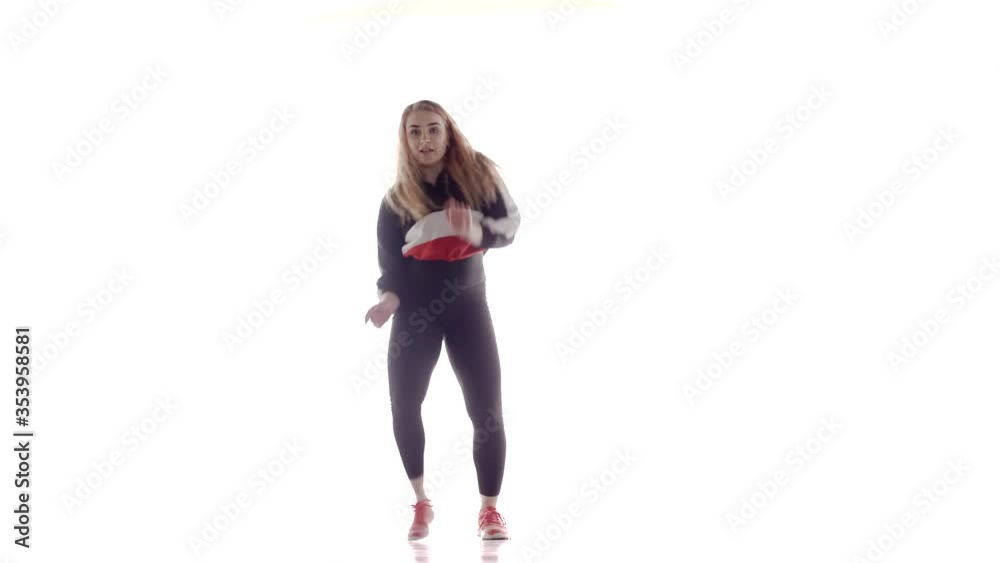 Trendy young woman dancing hip hop. Contemporary choreography. Isolated. Long shot Trendy young woman dancing hip hop. Contemporary choreography. Isolated. Long shot