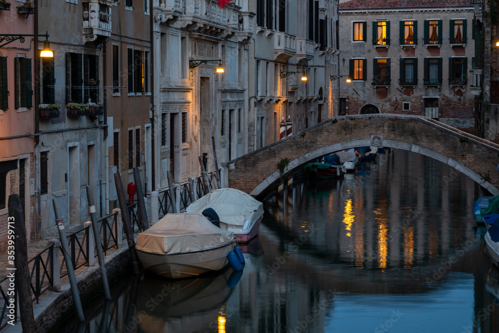 fascinating water canal at dusk in Venice Italy