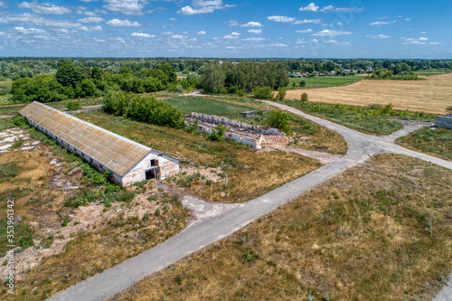 Abandoned and destroyed rural farm, aerial view