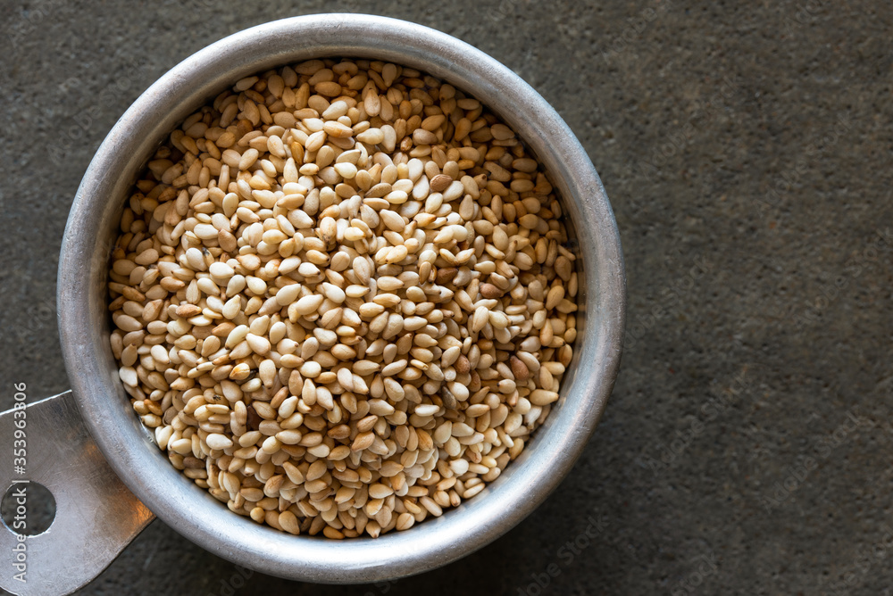 Toasted Sesame Seeds in a Measuring Cup Toasted Sesame Seeds in a Measuring Cup
