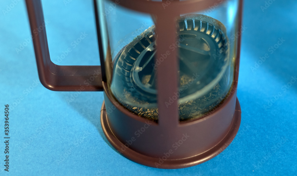 tea in glass jar with blue background
