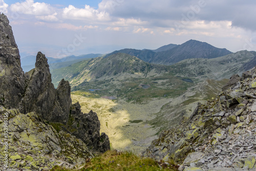 Panoramic view over steep and rocky mountain valley in Retezat National Park, Romania © AnteGabrielPhotoArt