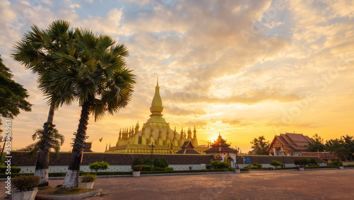 Pha That Luang Vientiane Golden Pagoda in Vientiane, Laos. sunset sky background beautiful.