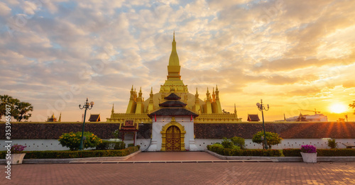 Pha That Luang Vientiane Golden Pagoda in Vientiane  Laos. sunset sky background beautiful.