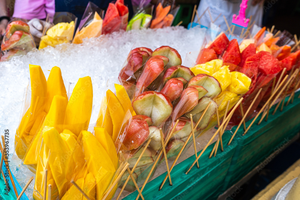 the different ice. street trade A group of colorful fruits.