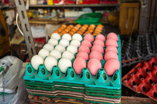 color egg background, Century Eggs in market Thailand , Twocolor egg background., brown and pink egg for food. photo