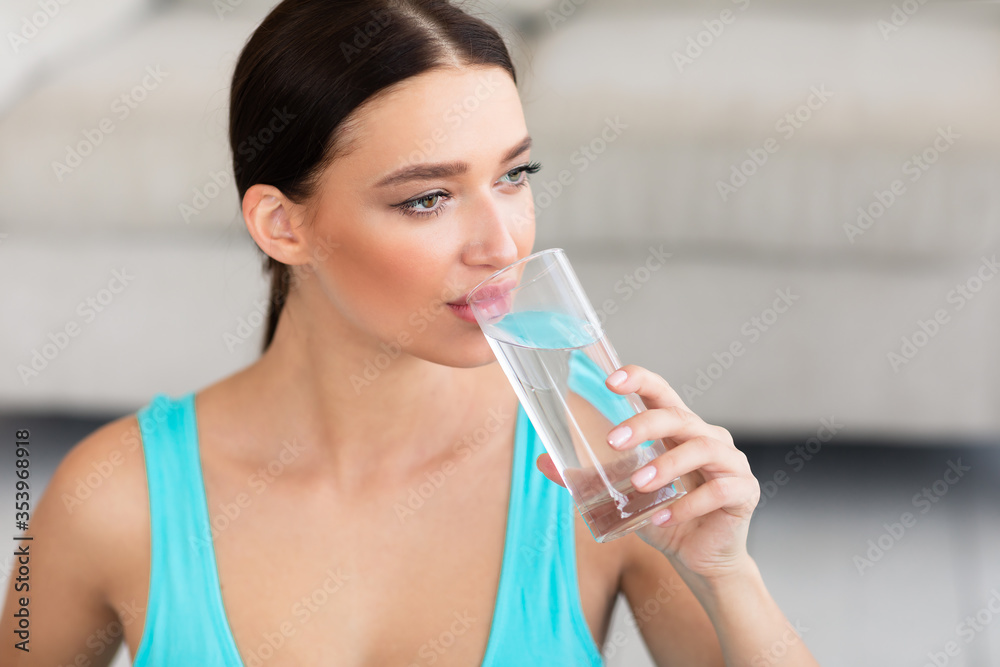 Fit Woman Drinking Water From Glass Losing Weight At Home Fit Woman Drinking Water From Glass Losing Weight At Home